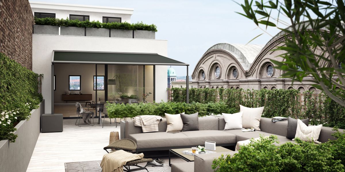 markilux pergola compact mit schwarzem Tuch auf der Dachterrasse eines modernen Penthouses.